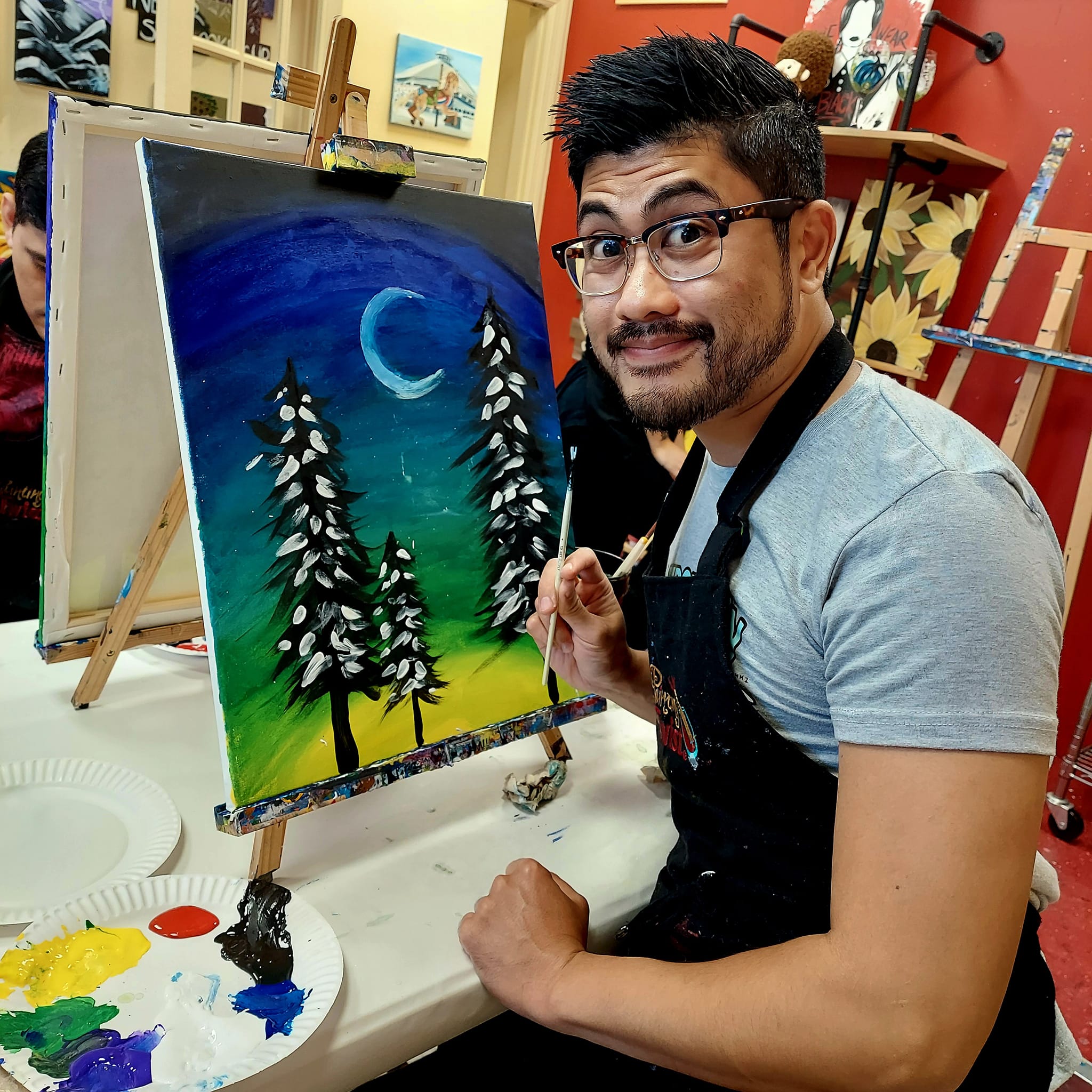 Dr. Yang Painting a Winter Scene